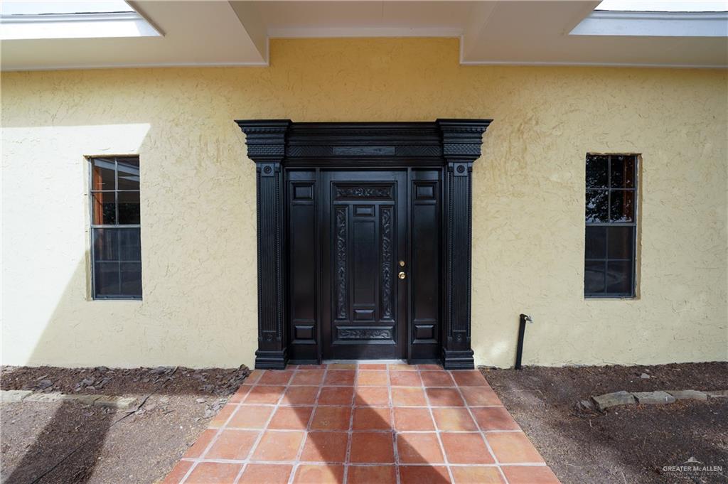 3178 El Campo Road Rio Grande City, TX 78582 - Photo 11 of 40 a building with a black gate