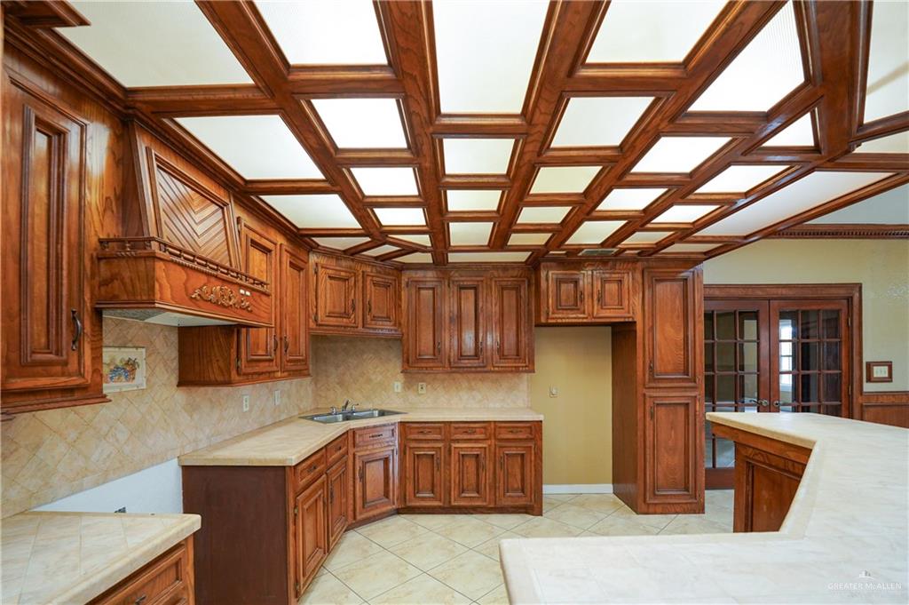 3178 El Campo Road Rio Grande City, TX 78582 - Photo 16 of 40 a kitchen with a sink cabinets and wooden floor