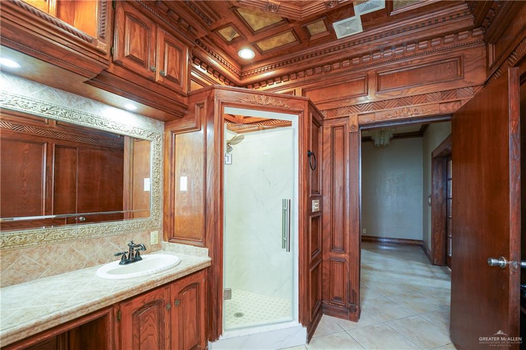 3178 El Campo Road Rio Grande City, TX 78582 - Photo 19 of 40 a bathroom with a sink and a mirror