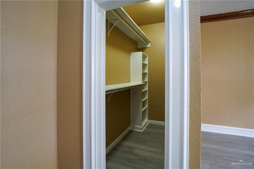 3178 El Campo Road Rio Grande City, TX 78582 - Photo 25 of 40 a view of hallway with wooden floor