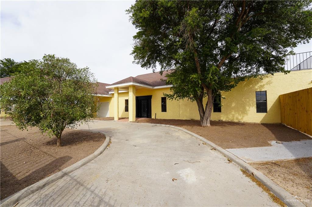 3178 El Campo Road Rio Grande City, TX 78582 - Photo 6 of 40 a view of a house with a yard and large tree