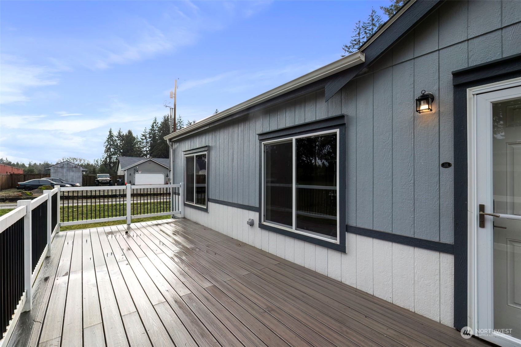 17340 Sargent Road Southwest, Unit 24 Rochester, WA 98579 - Photo 1 of 26 a view of deck with a large space and wooden floor