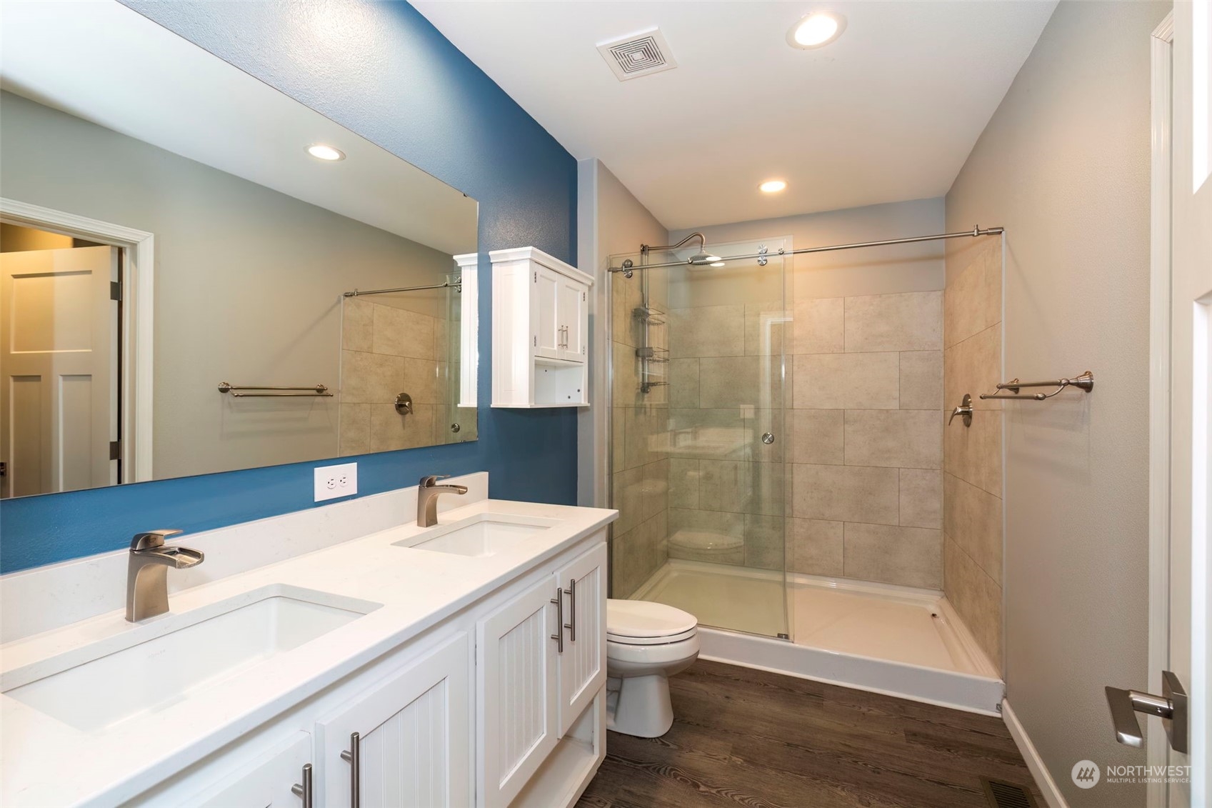 17340 Sargent Road Southwest, Unit 24 Rochester, WA 98579 - Photo 15 of 26 a bathroom with a sink a toilet and shower