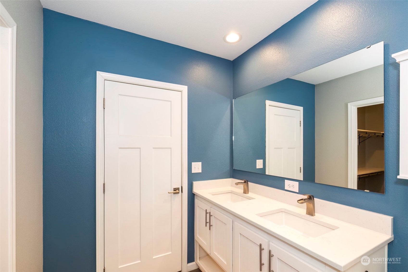 17340 Sargent Road Southwest, Unit 24 Rochester, WA 98579 - Photo 16 of 26 a bathroom with a sink and a mirror