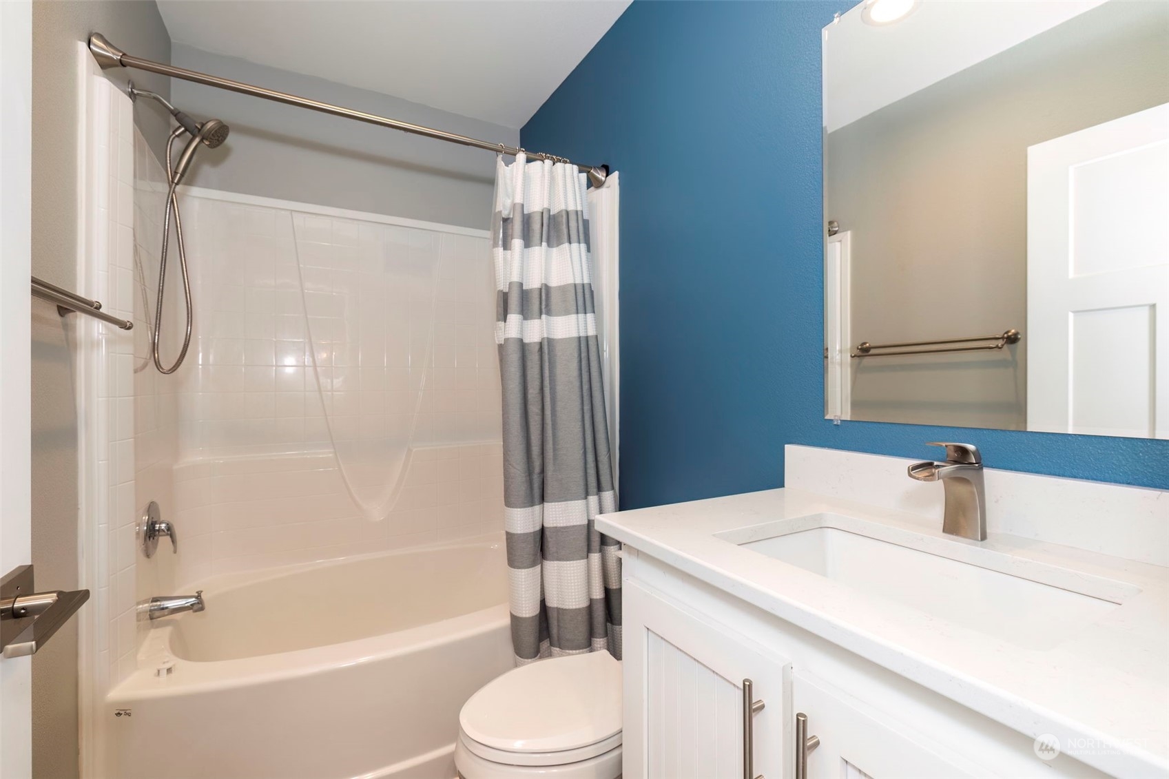 17340 Sargent Road Southwest, Unit 24 Rochester, WA 98579 - Photo 21 of 26 a bathroom with a sink toilet and shower