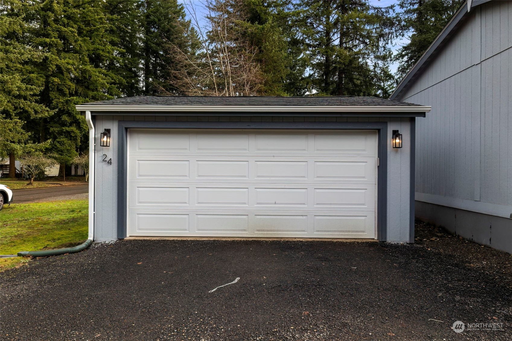 17340 Sargent Road Southwest, Unit 24 Rochester, WA 98579 - Photo 23 of 26 a view of backyard and garage
