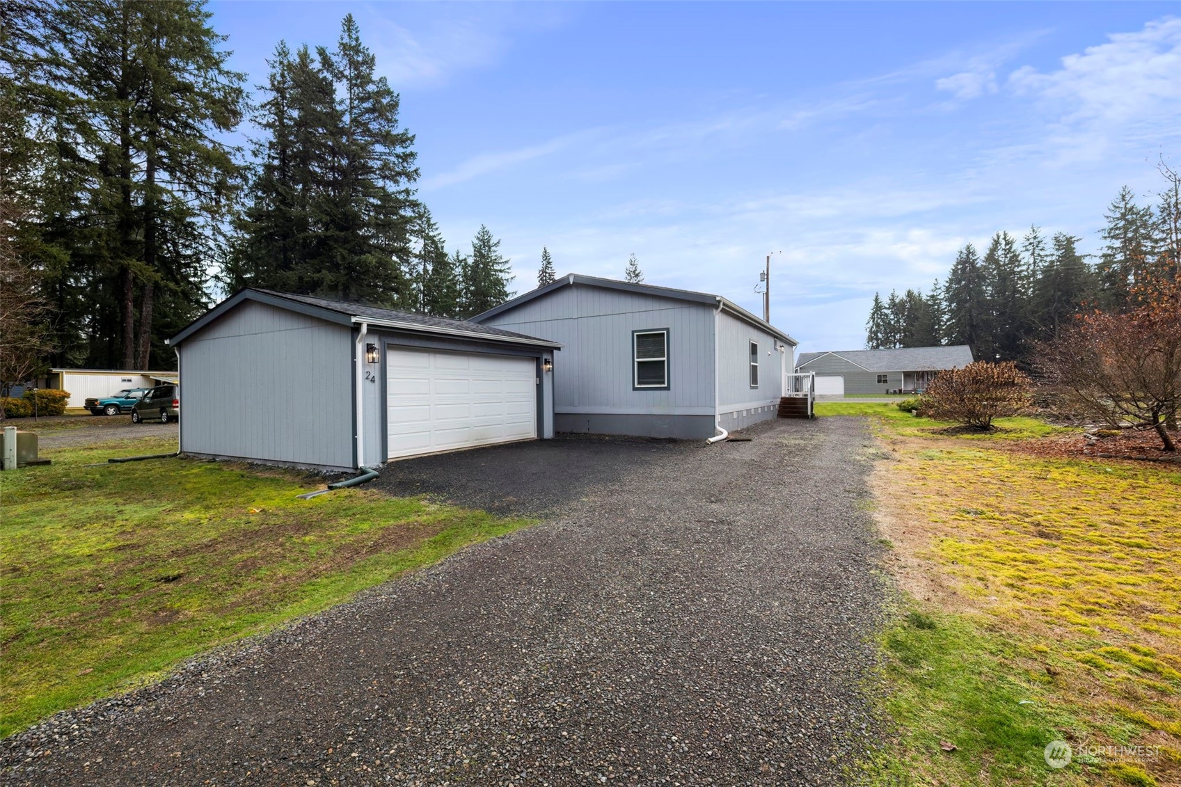 17340 Sargent Road Southwest, Unit 24 Rochester, WA 98579 - Photo 5 of 26 a view of a house with backyard and sitting area
