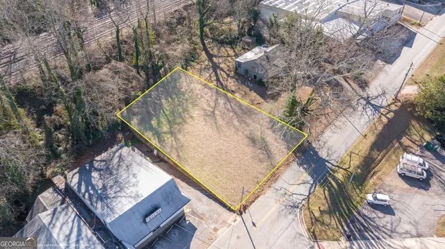 a view of swimming pool with a yard