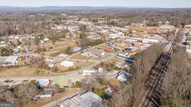 an aerial view of residential house and outdoor space
