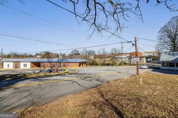 a view of a street with cars