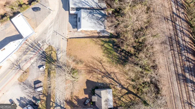 view of a house with a snow
