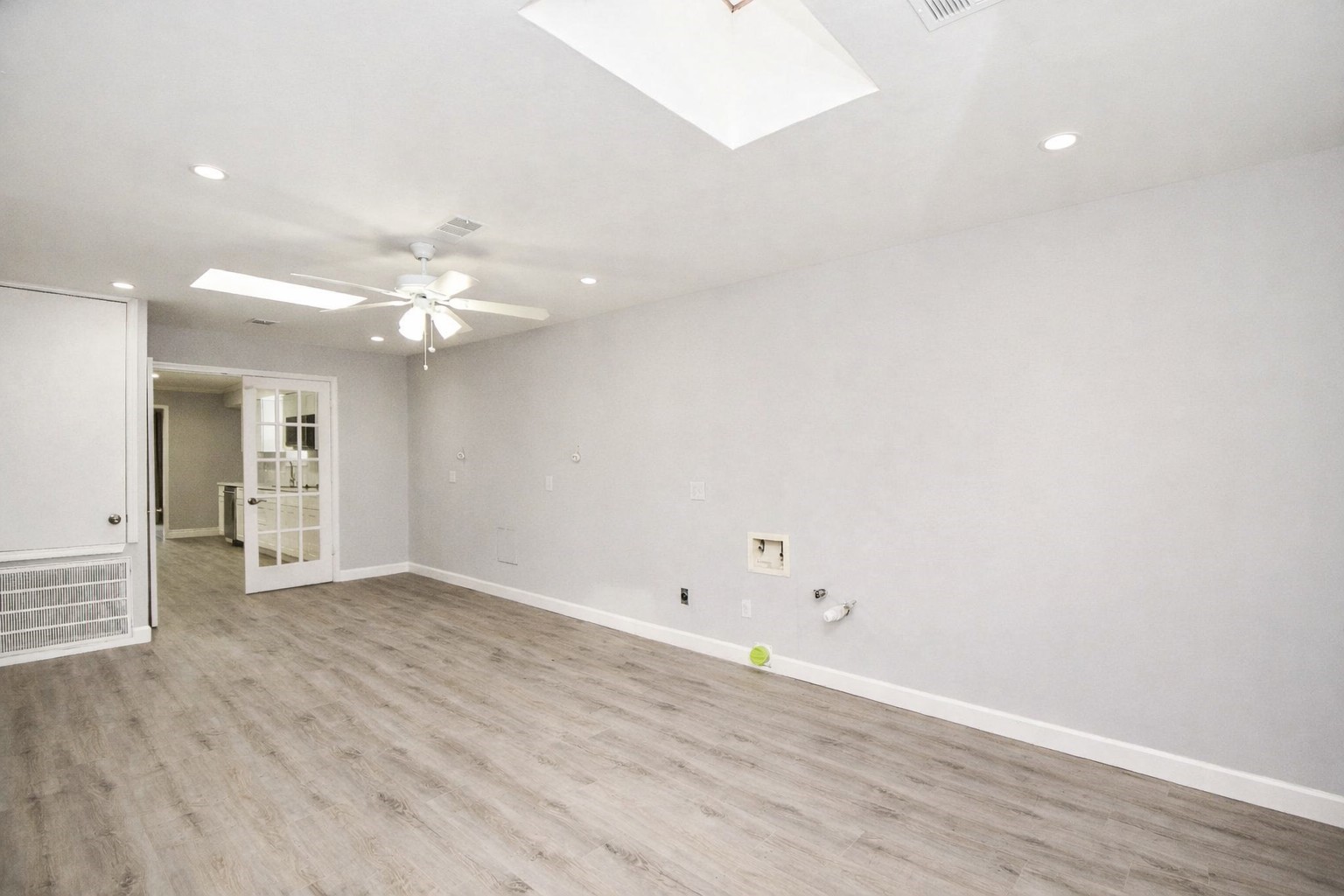 14011 Wickersham Lane Houston, TX 77077 - Photo 18 of 38 Located just off the kitchen, this incredible mudroom with exterior access offers exceptional organization and everyday functionality.