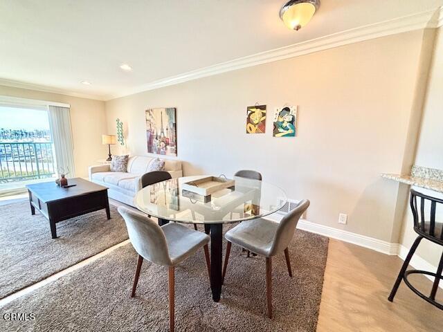 3101 Peninsula Road, Unit 217 Oxnard, CA 93035 - Photo 11 of 17 a living room with furniture and a window
