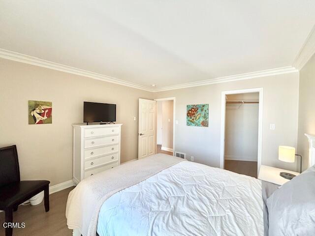 3101 Peninsula Road, Unit 217 Oxnard, CA 93035 - Photo 17 of 17 a bedroom with a bed and a flat screen tv