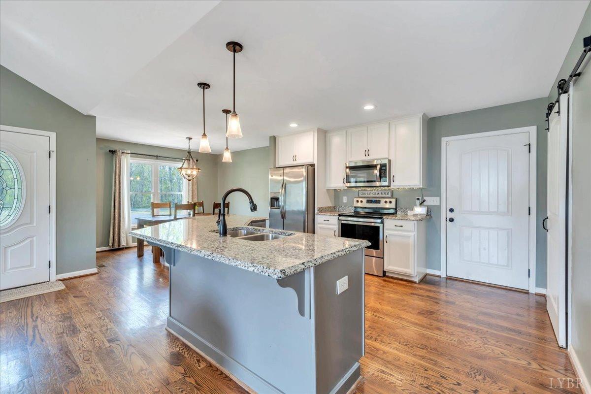 1400 Mountain Cut Road Appomattox, VA 24522 - Photo 3 of 55 a kitchen with counter top space and appliances