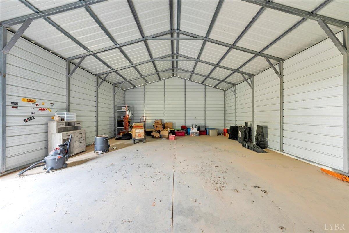 1400 Mountain Cut Road Appomattox, VA 24522 - Photo 33 of 55 a view of a garage with storage