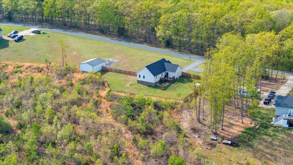 1400 Mountain Cut Road Appomattox, VA 24522 - Photo 47 of 55 a view of a backyard with plants and lake view