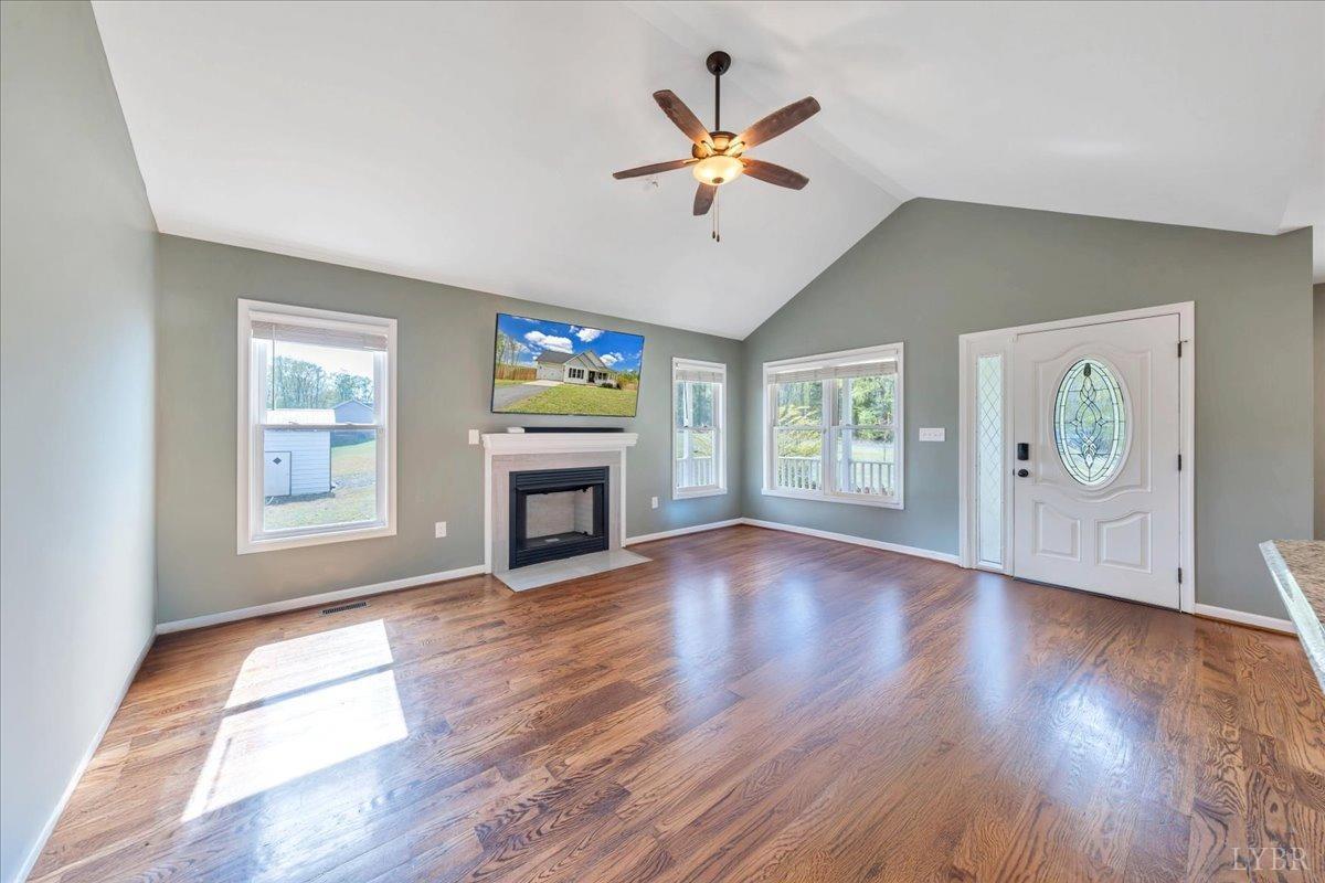 1400 Mountain Cut Road Appomattox, VA 24522 - Photo 8 of 55 a view of an empty room with window and wooden floor