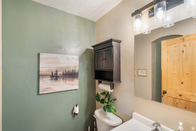 2013 North River View Road Huntsville, UT 84317 - Photo 24 of 53 Bathroom with vanity and a textured wall