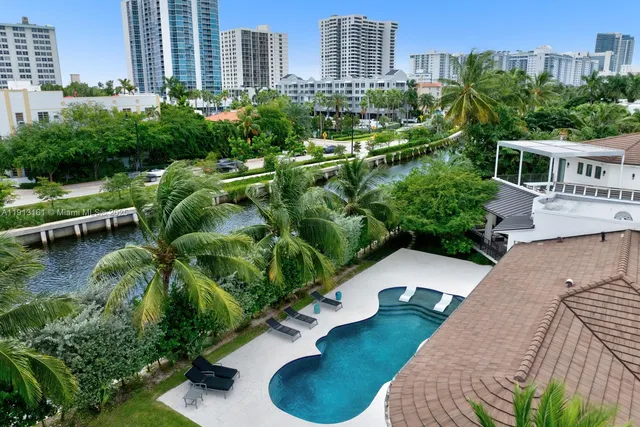 a view of a back yard of the house and a garden