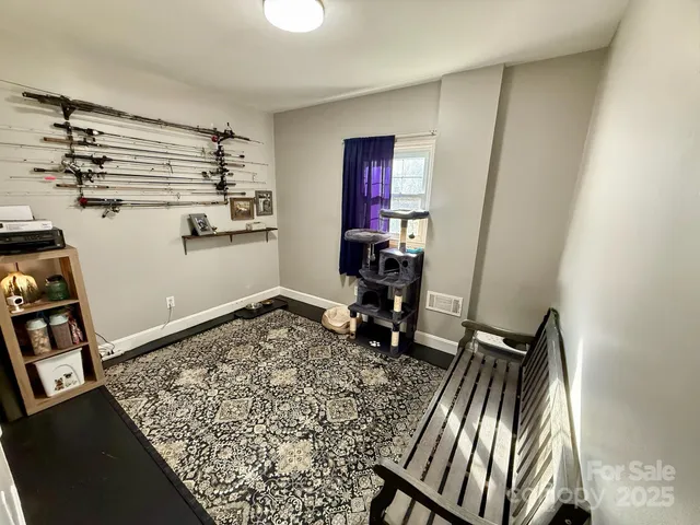 a view of workspace with furniture and window