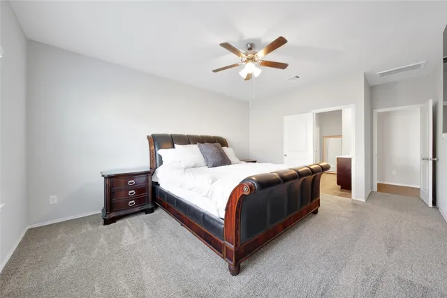 a bedroom with a bed and closet