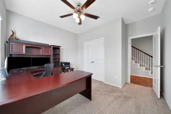 a room with furniture and a fireplace