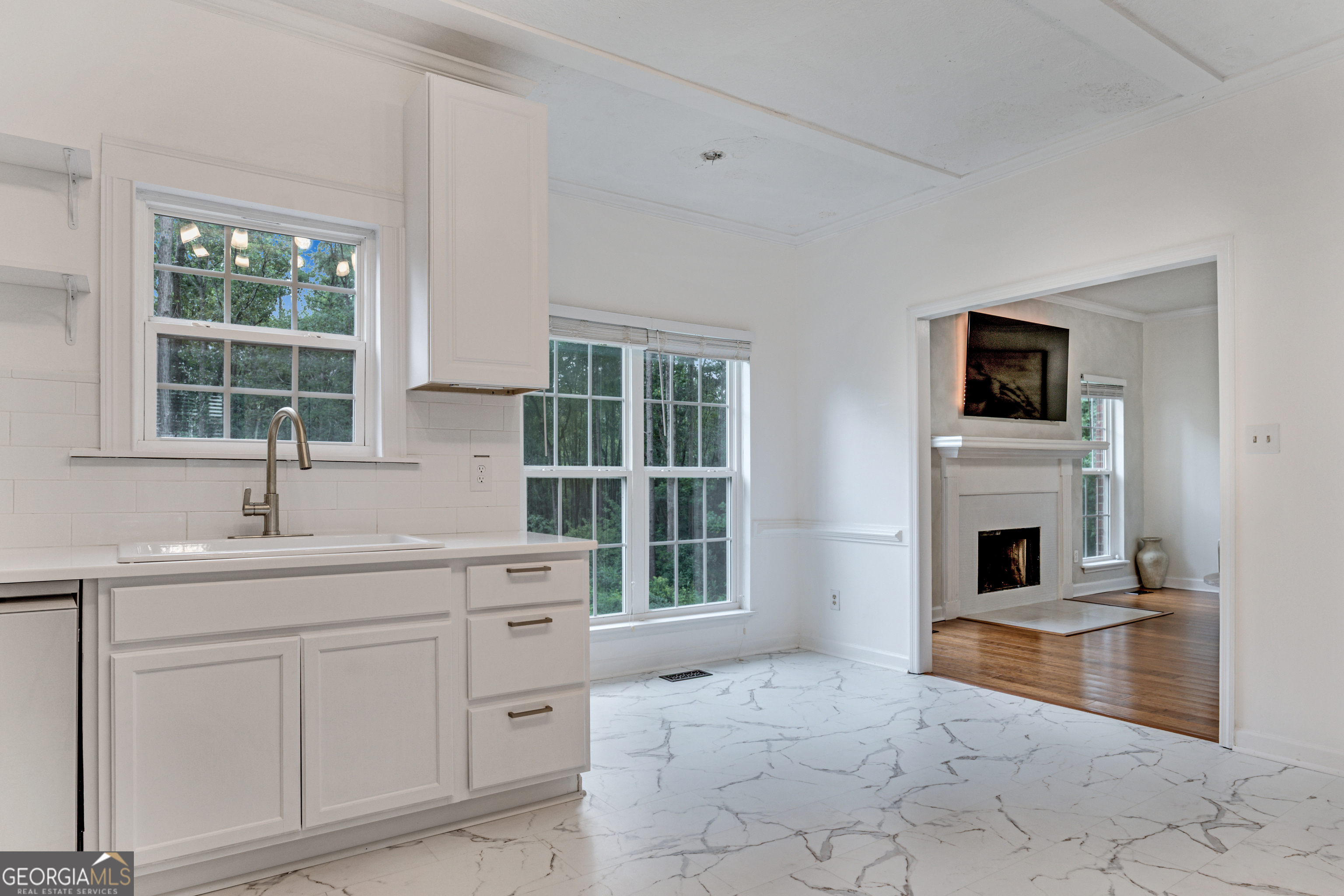 2535 Sand Ridge Court Hephzibah, GA 30815 - Photo 16 of 41 a view of a kitchen with sink cabinet and natural light