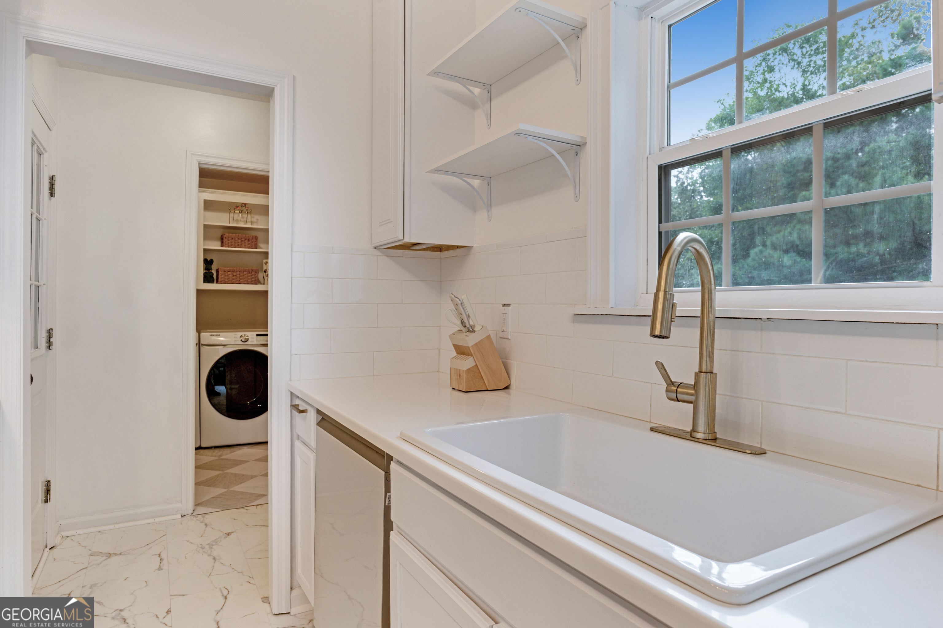 2535 Sand Ridge Court Hephzibah, GA 30815 - Photo 17 of 41 a bathroom with a sink and a mirror
