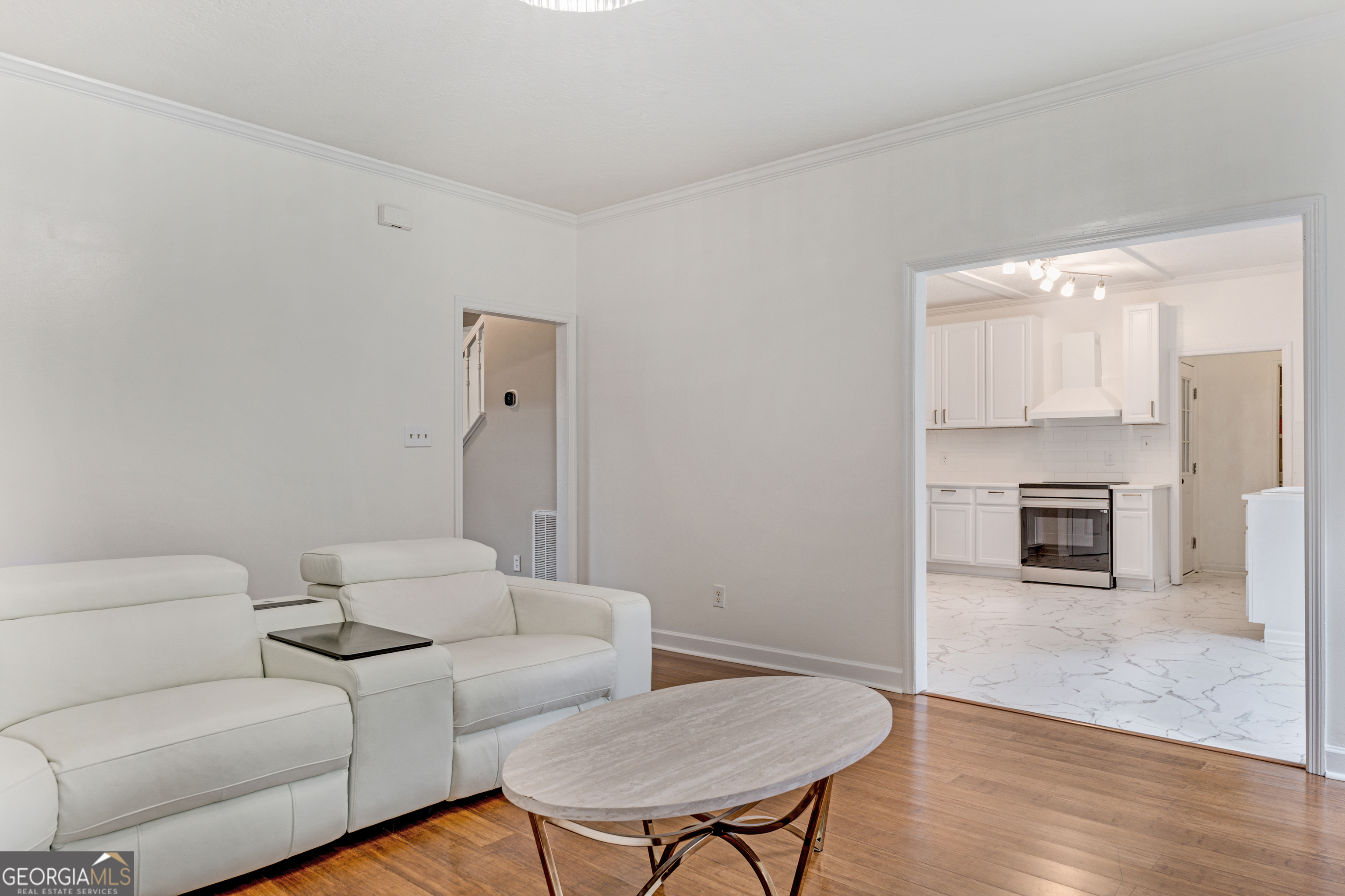 2535 Sand Ridge Court Hephzibah, GA 30815 - Photo 23 of 41 a living room with furniture and a fireplace