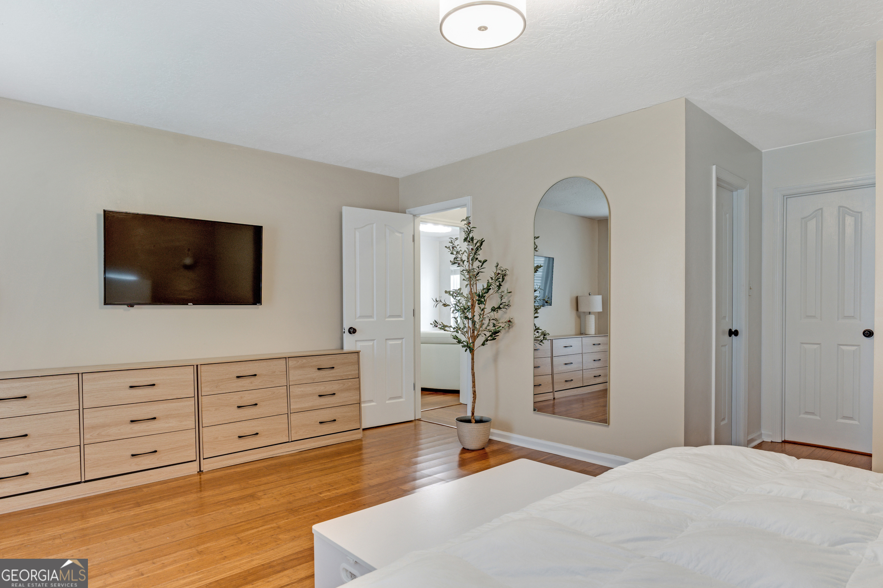 2535 Sand Ridge Court Hephzibah, GA 30815 - Photo 26 of 41 a bedroom with a bed and flat screen tv