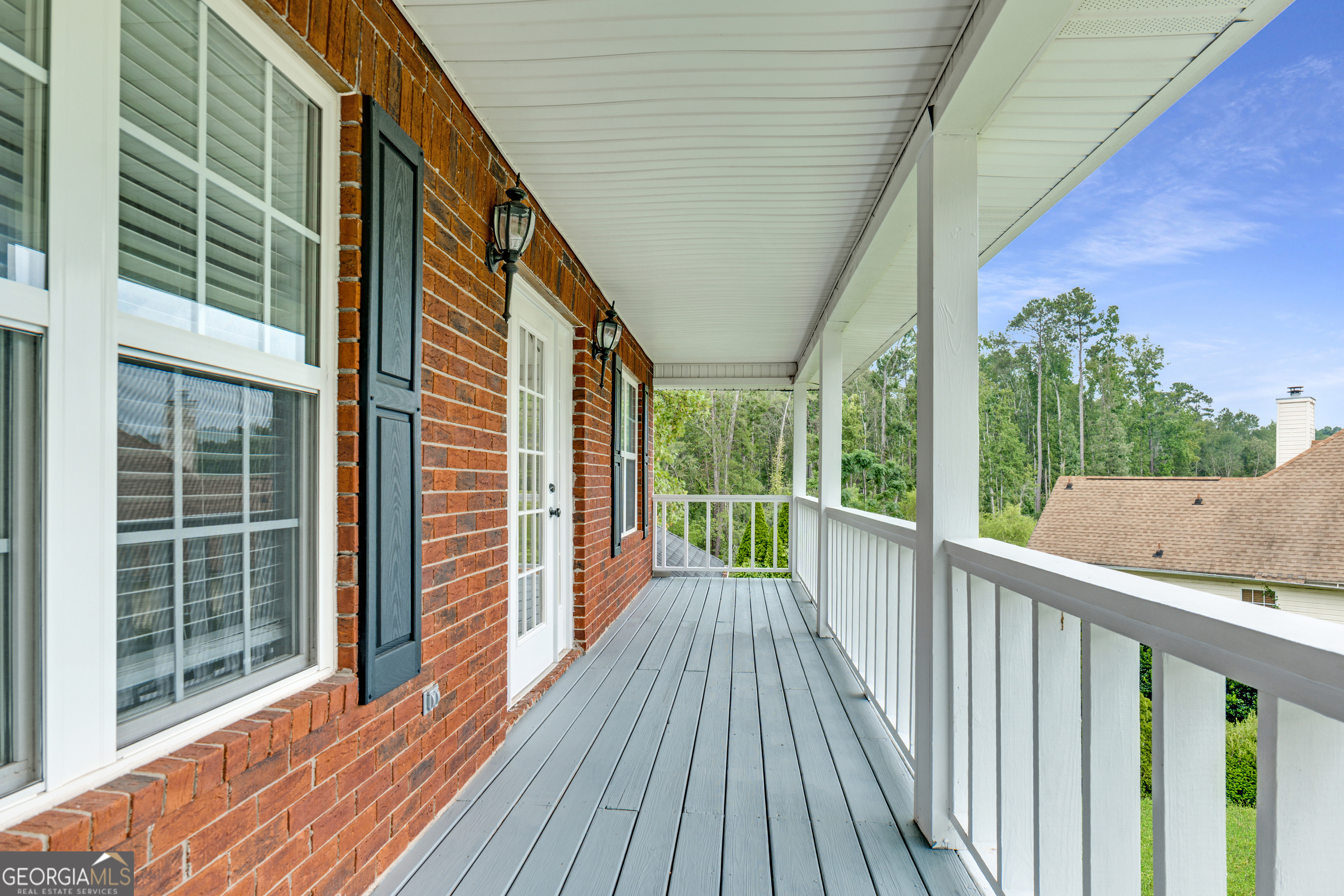 2535 Sand Ridge Court Hephzibah, GA 30815 - Photo 32 of 41 a view of a balcony with wooden floor and fence