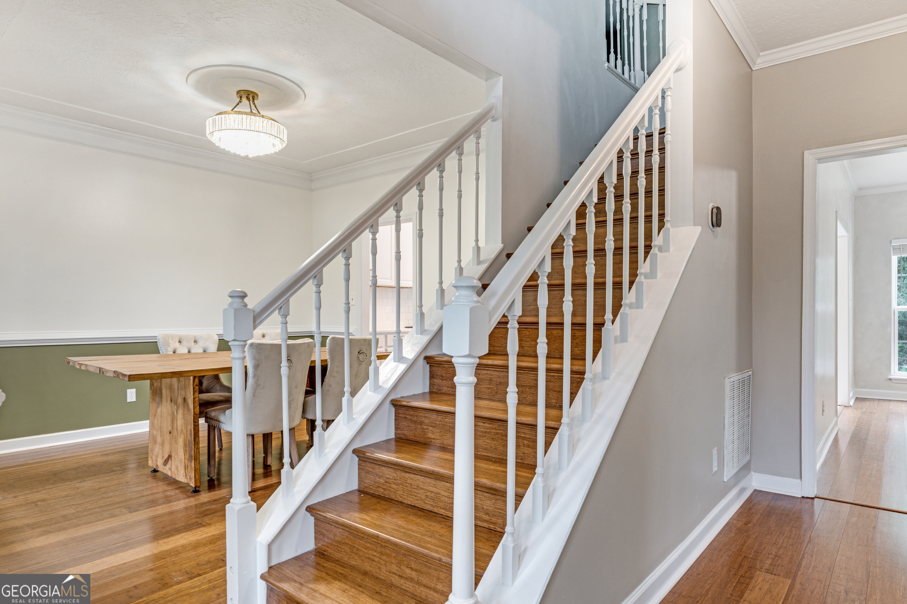 2535 Sand Ridge Court Hephzibah, GA 30815 - Photo 9 of 41 a view of staircase with wooden floor and staircase
