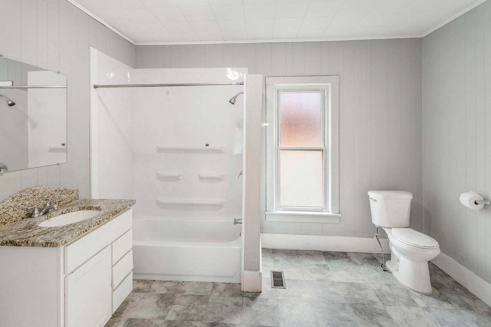705 Nicholson Street Joliet, IL 60435 - Photo 11 of 26 a bathroom with a granite countertop sink toilet and shower