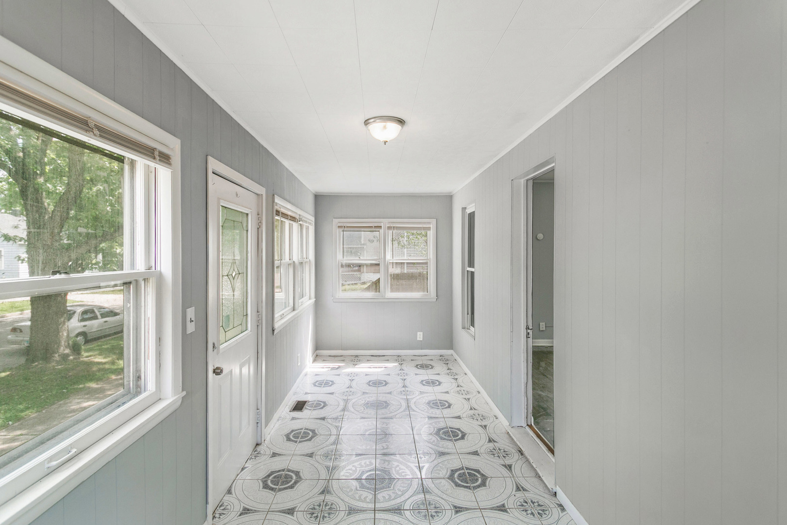 705 Nicholson Street Joliet, IL 60435 - Photo 14 of 26 a view of a hallway with windows