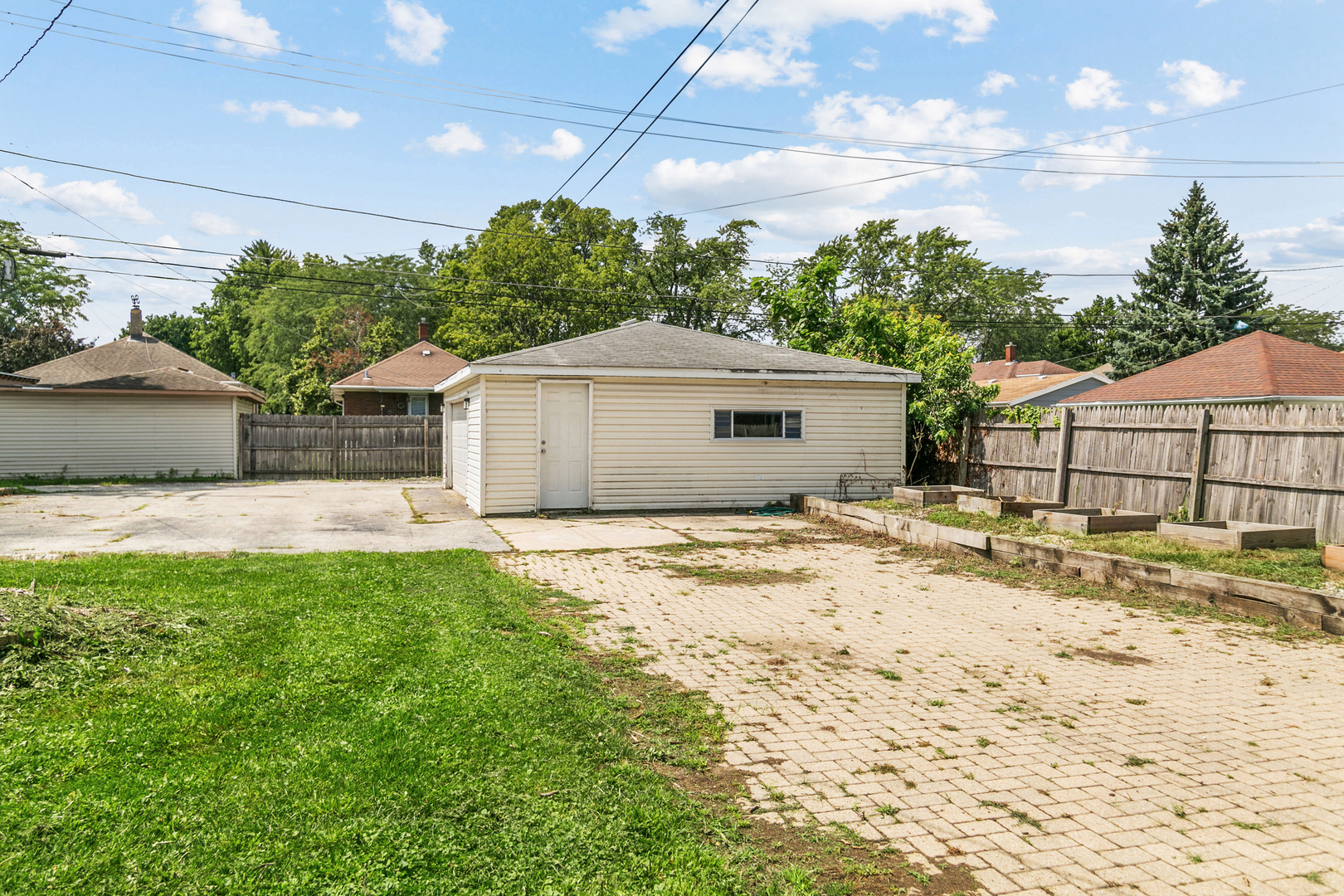 705 Nicholson Street Joliet, IL 60435 - Photo 20 of 26 a house view with a backyard space