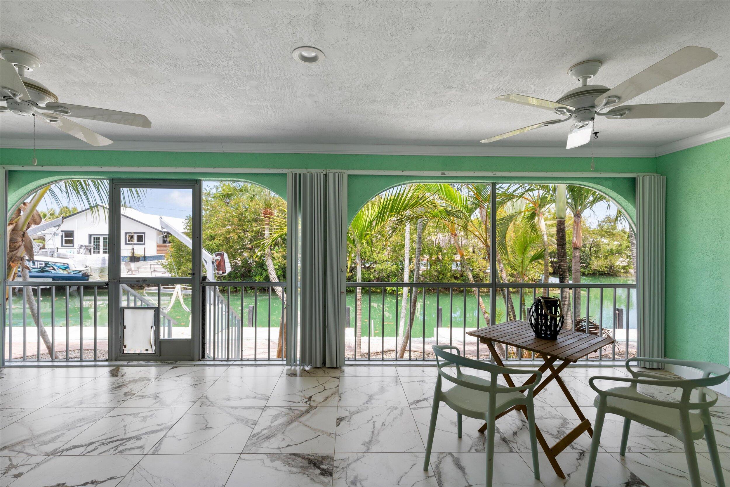 21025 3rd Avenue Cudjoe, FL 33042 - Photo 27 of 43 Screened Patio