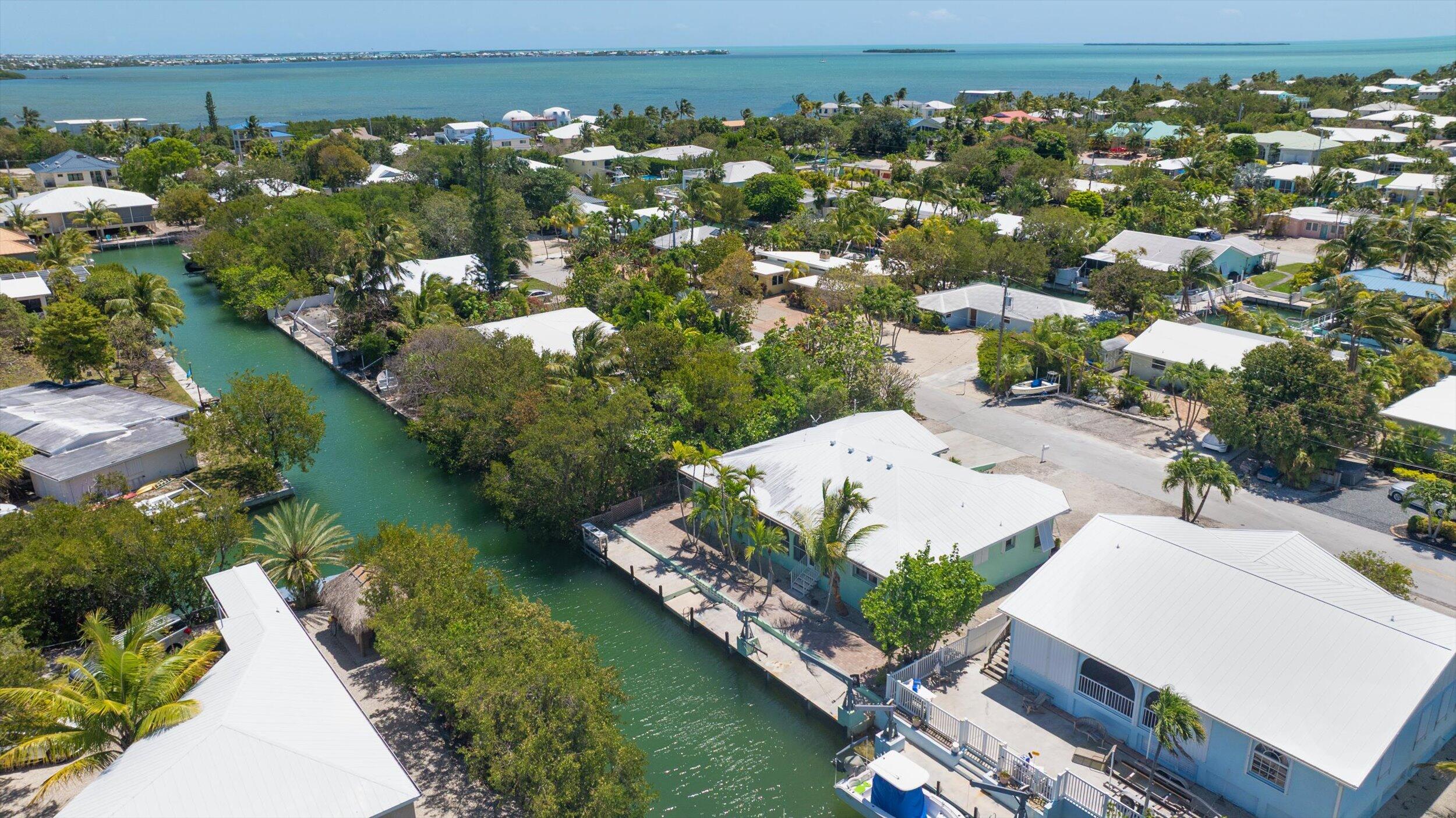 21025 3rd Avenue Cudjoe, FL 33042 - Photo 29 of 43 an aerial view of a house with a yard lake view