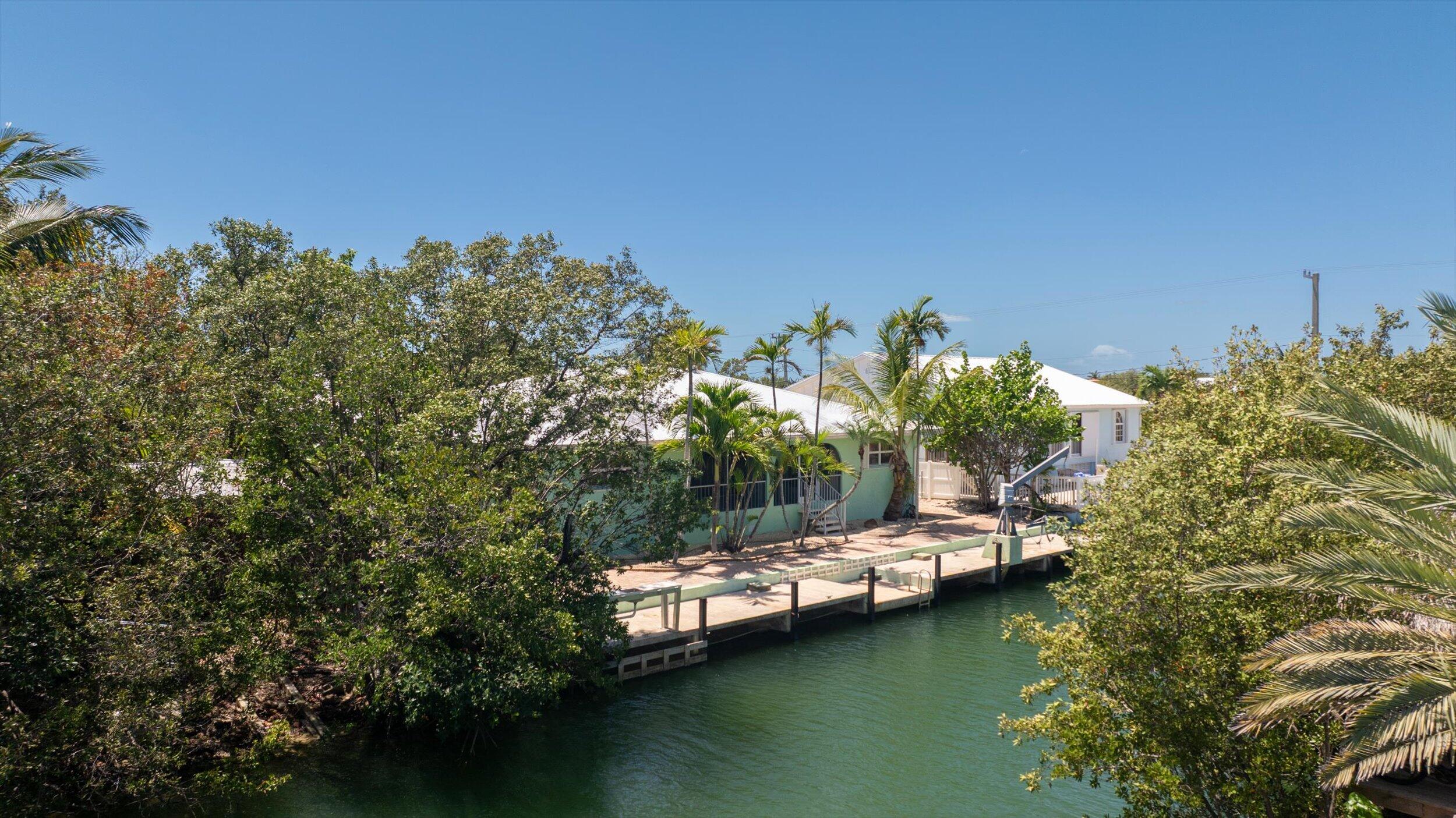 21025 3rd Avenue Cudjoe, FL 33042 - Photo 31 of 43 a view of a lake with houses