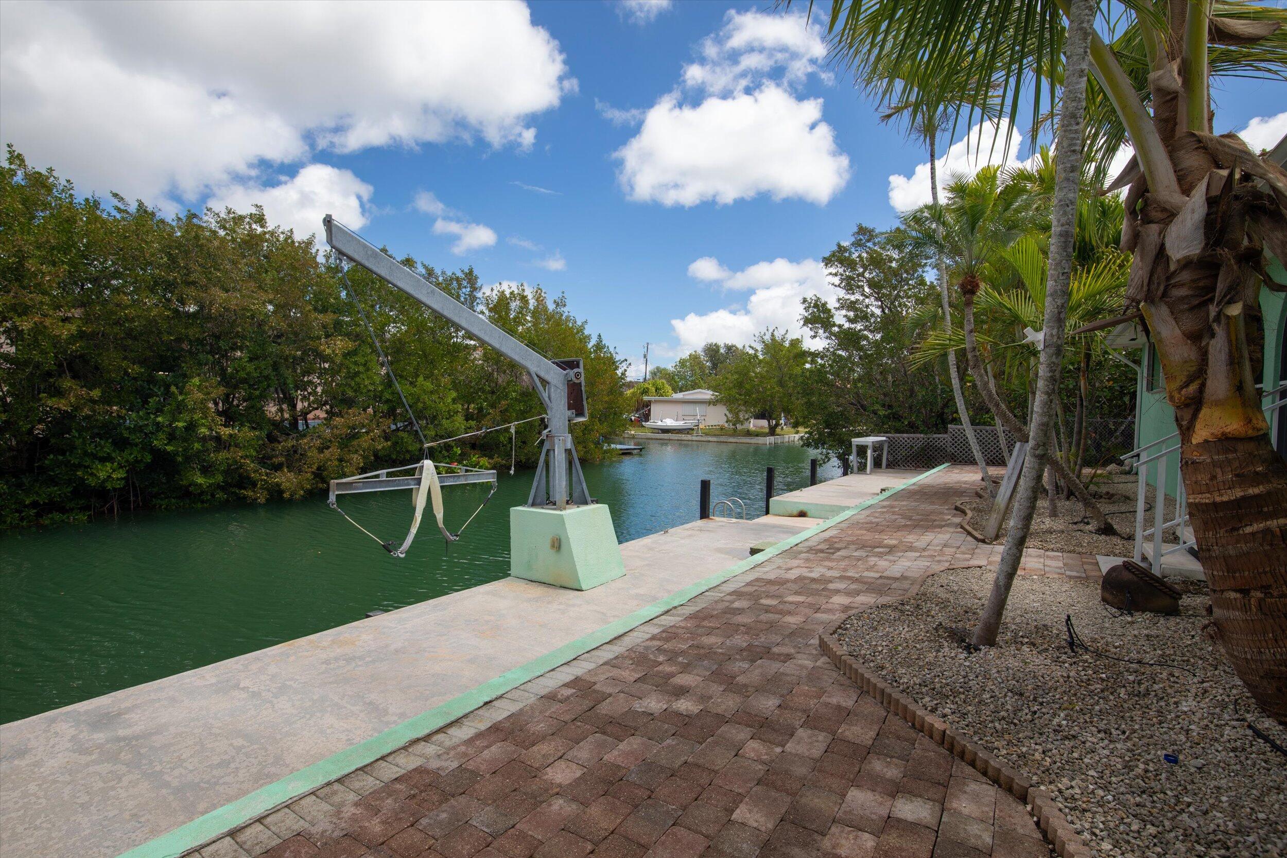 21025 3rd Avenue Cudjoe, FL 33042 - Photo 39 of 43 a house view with a garden space