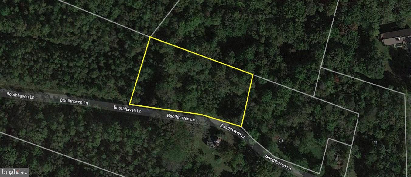 159 Boothhaven Lane Owings, MD 20736 - Photo 7 of 8 a terrace with lots of trees in the background