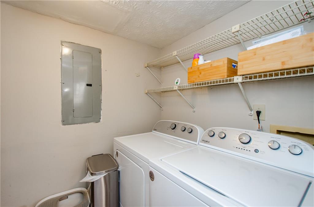 1066 Wedgewood Lane Tucker, GA 30084 - Photo 16 of 23 a utility room with dryer and washer