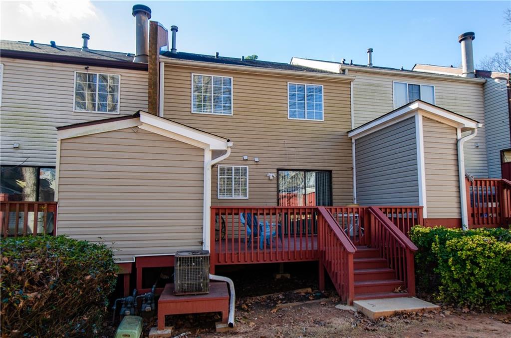 1066 Wedgewood Lane Tucker, GA 30084 - Photo 4 of 23 a front view of a house with a yard