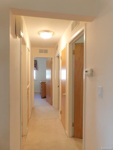 15325 Wick Road Allen Park, MI 48101 - Photo 29 of 45 HALL WITH DIGITAL PROGRAMMABLE THERMOSTAT, 2 LINEN STORAGE CABS+LINEN CLOSET!