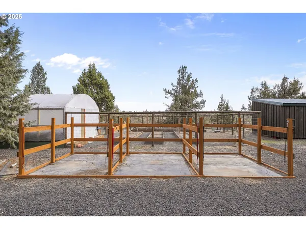a view of a house with a yard and garage