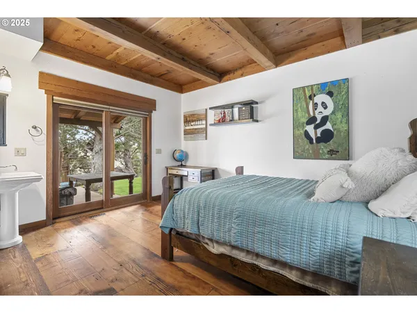 a view of a room with wooden walls