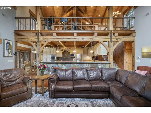 a view of a couch and a fireplace in a living room