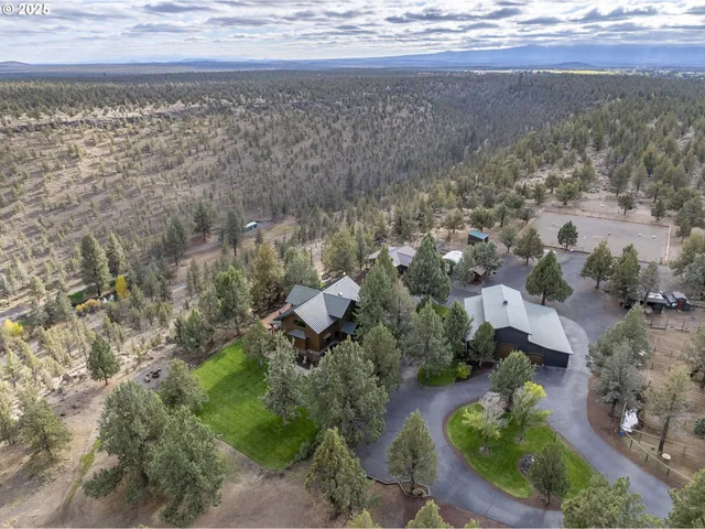 a view of a lake with beach and outdoor space