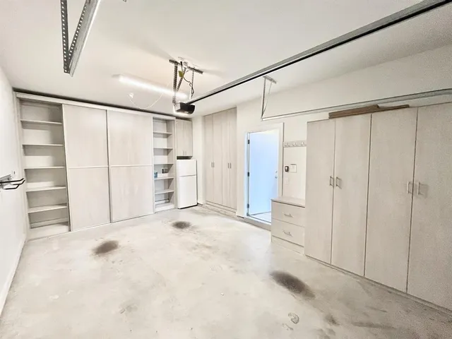 a view of a closet area with hallway