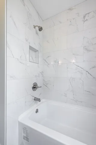 a bathroom with a bathtub